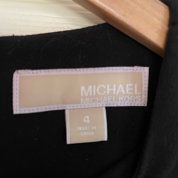 Michael Kors black dress with a feather bottom - Picture 2 of 2